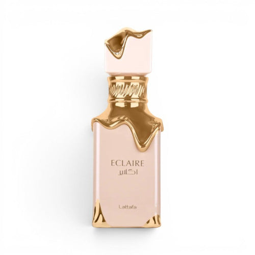 Scent Sphere Eclaire Lattafa unisex Eau de Parfum bottle with gold accents and a creamy beige finish.