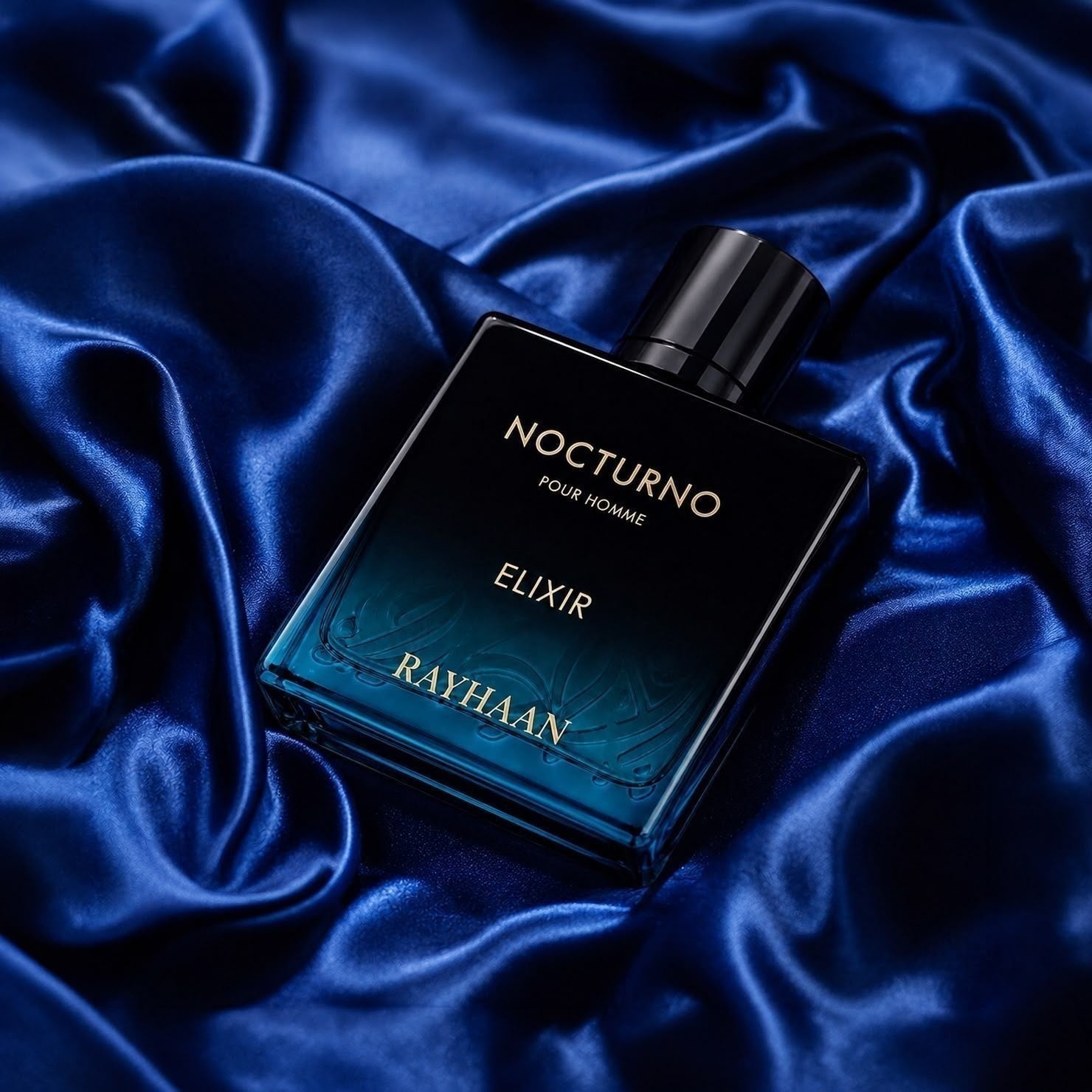Scent Sphere Nocturno Elixir Pour Homme fragrance bottle with golden amber notes on dark blue satin.